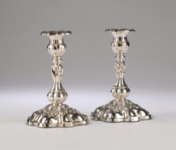 Carl M. Cohr. A pair of baroque silver candlesticks (2)