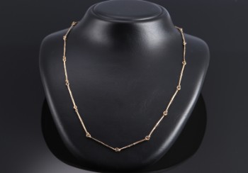 Split necklace of 14 kt. satin gold