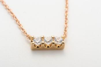Necklace with integrated pendant with 3 faceted cubic zirconia, 8 kt. gold