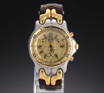 TAG Heuer Chronograph 200 Meters. Mens watch in partially gilded steel with golden disc, approx. The 1990s