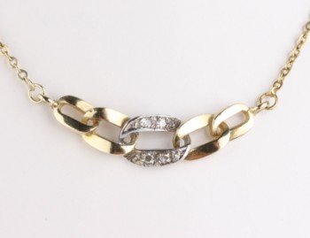 Diamond necklace in 14 kt gold and bow brooch in 8 kt with diamonds (2)