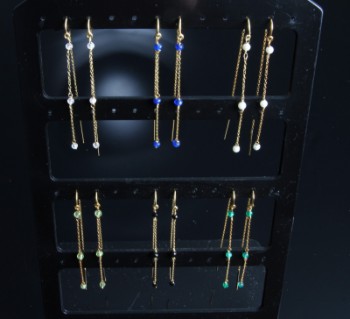Collection of earrings/earwires with precious stones, gold-plated silver