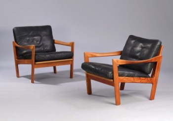 Illum Wikkelsø. A pair of armchairs, teak, model 20, black leather (2)
