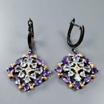 A pair of topaz and amethyst earrings in black rhodium-plated sterling silver with gold plating (2)