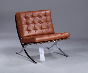 Ludwig Mies van der Rohe. Lænestol i cognacfarvet læder model Barcelona stol