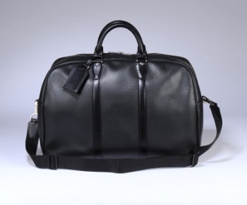 Louis Vuitton. Kendall PM travel bag in Black Taiga leather
