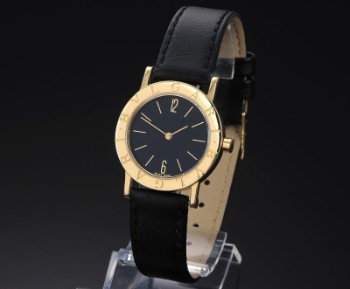 Bvlgari BB30GL. Ladies watch in 18 kt. gold with black dial, 1990s