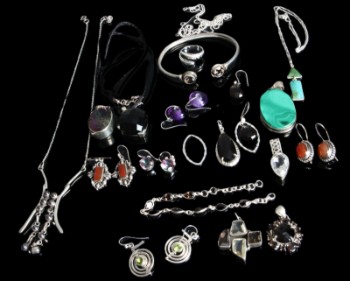 Collection of silver jewelery with precious stones