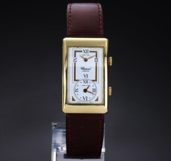 Chopard Dual Time Zone. Mens watch in 18 kt. gold with white dial