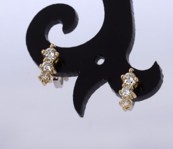 Poesia Crieri. Mini brilliant earrings of 18 kt. gold and white gold, a total of approx. 0.20 ct. (2)