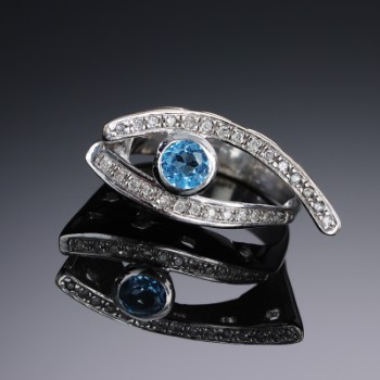 Topaz and diamond ring in 14 kt. white gold