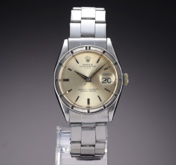 Rolex Date. Vintage mens watch in steel with silver dial, approx. 1962