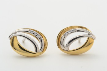 Pair of earrings of 14 kt. gold and white gold with cubic zirconia