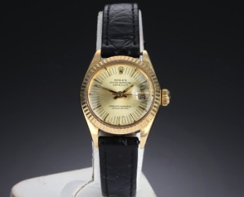 Rolex Datejust. Ladies watch in 18 kt. gold with golden disc, approx. 1973