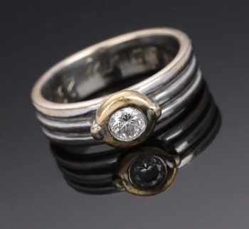 Solitaire diamond ring of 18 kt. gold and white gold, approx. 0.20 ct.