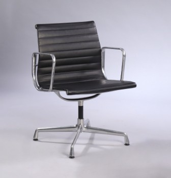 Charles Eames. Armchair in black leather, model EA-108