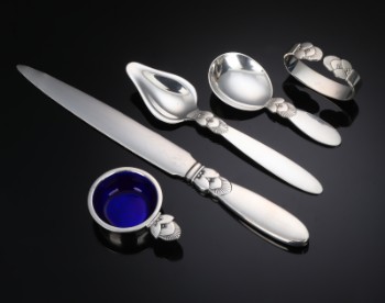 Georg Jensen. Cactus salt shaker, letter knife, napkin ring and various sterling silver cutlery (5)