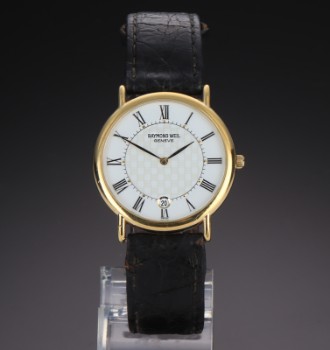 Raymond Weil Tango. Mens watch in gold-plated steel with two-tone dial, approx. 2000