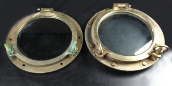 Two portholes of brass with each mirror and glass (2)
