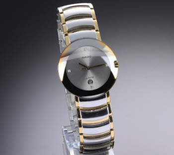 Rado Diastar Anniversary. Mens watch in partially gold-plated steel with silver-coloured diamond-set dial, 1990s