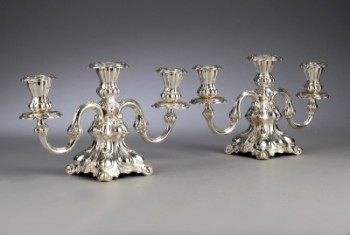 Hans Jensen & Co. A pair of three-armed silver candlesticks in baroque form, anno 1946 (2)