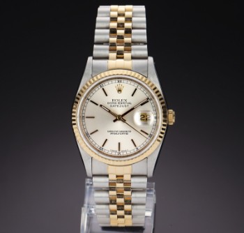 Rolex Datejust. Mens watch in 18 kt. gold and steel with silver dial, approx. 1989