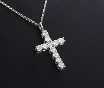 Diamond cross pendant in chain of 18 kt. white gold, 0.69 ct. (2)