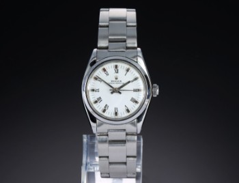 Rolex Oyster Perpetual. Mid-size ladies watch in steel with white dial, approx. 1974