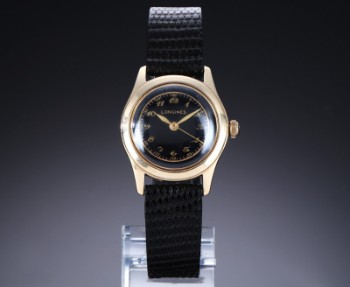 Longines. Vintage ladies watch in 14 kt. gold with black disc, approx. 1941