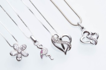 Four sterling silver pendants and chains (4)
