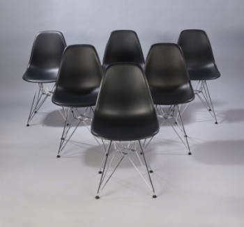 Charles Eames. A set of six chairs, model DSR, black polypropylene (6)