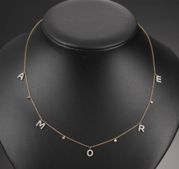 Diamonds by Frisenholm. Amore necklace of 18 kt. gold with diamonds