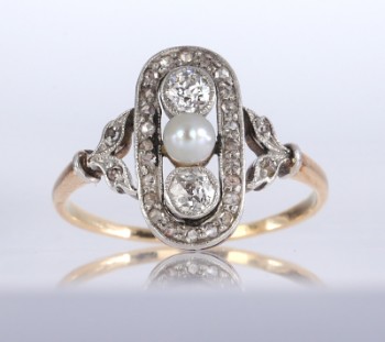 Vintage Art Deco pearl-diamond ring of 14 kt. gold and platinum