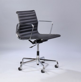 Charles Eames. Office chair in black leather, model EA-117
