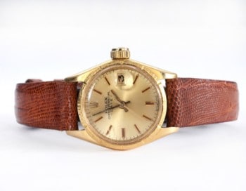 Rolex Date. Vintage dameur i 18 kt. guld med gylden skive, ca. 1964